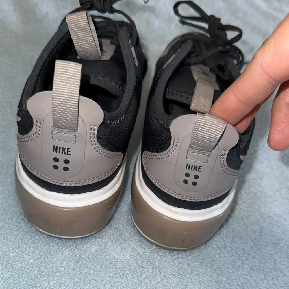 Nike women’s Black and Tan Sneakers
